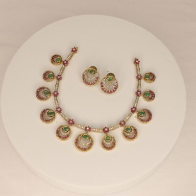 Trendy gold-plated necklace set with pink and green circular stone drops