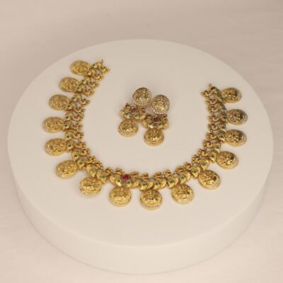Timeless elegance in every coin—adorn yourself with this intricately crafted gold jewelry set.