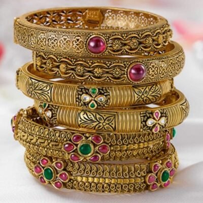Regal Antique Gold Bangles: Ruby & Emerald stones for timeless elegance.