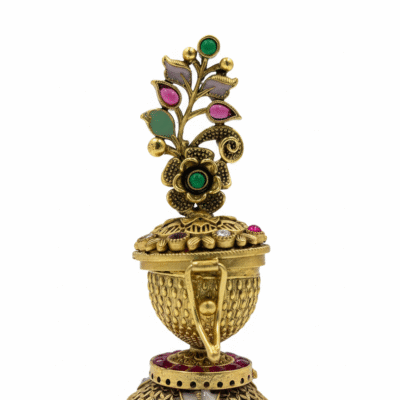 Ornate brass kumkum chimil with multicolored stone floral topper for pooja from Kulali Collections.